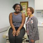 Patient and nurse practitioner in an exam room